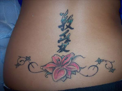 Japanese Flower and Kenji Tattoo Design on Lower Back Girl