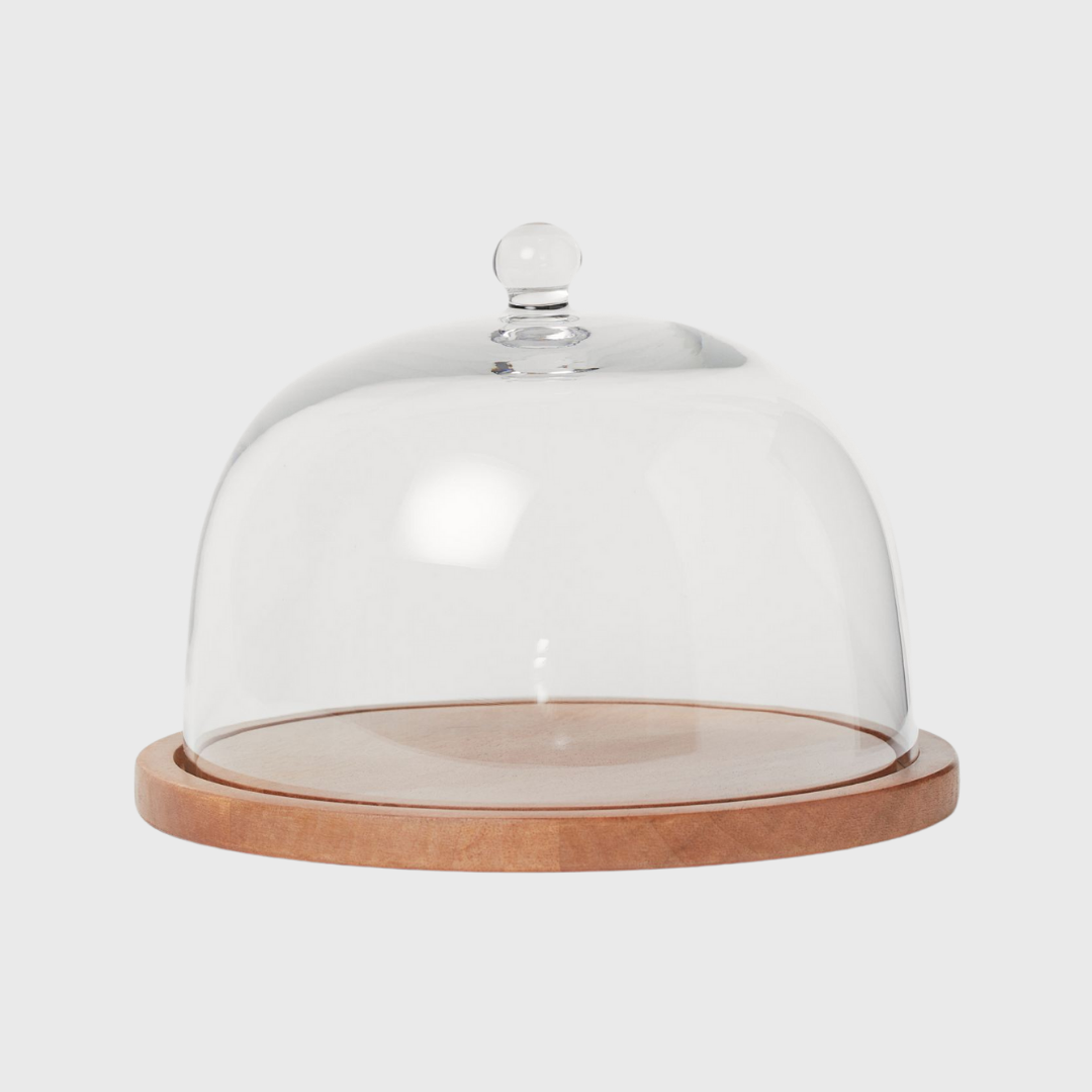 glass dome with wooden tray