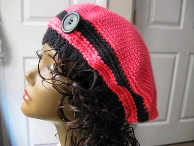 https://www.etsy.com/listing/33890213/crochet-flower-hat-pink-and-black-button?ref=shop_home_active