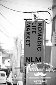 Signboard of NOMADIC LIFE MARKET