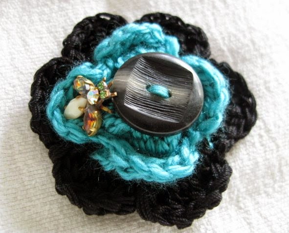 https://www.etsy.com/listing/194329045/crochet-brooch-black-and-turquoise-green?ref=shop_home_active_1