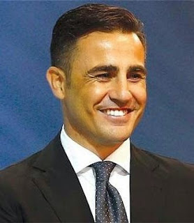 Fabio Cannavaro, coach of Guangzhou Evergrande, who is closing his eyes like if he already had Chinese eyes.