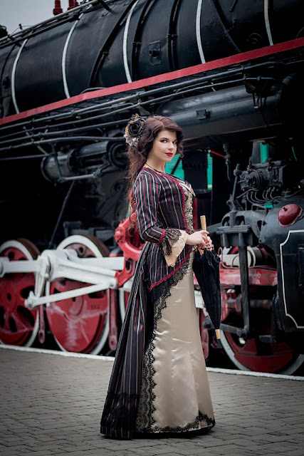 Women's Victorian costume (striped jacket with cream colored dress). Steampunk and Victorian clothing