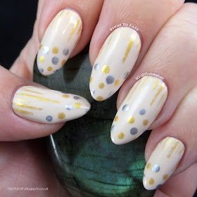 Recreation of Geeky Owl's New Year's Confetti nail art.