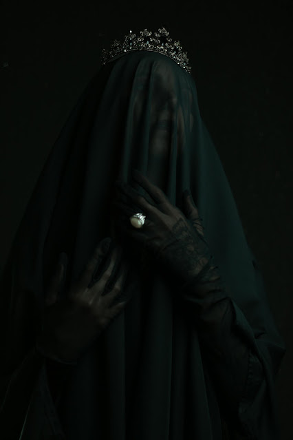 Woman In Black Veil With White Stoned Ring