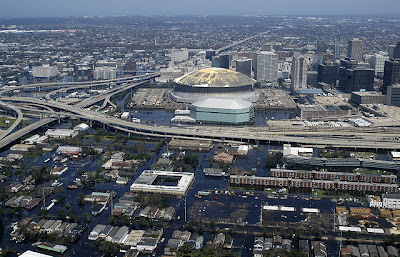 An aerial view from a United States Navy helicopter showing floodwaters around the Louisiana Superdome and surrounding area 