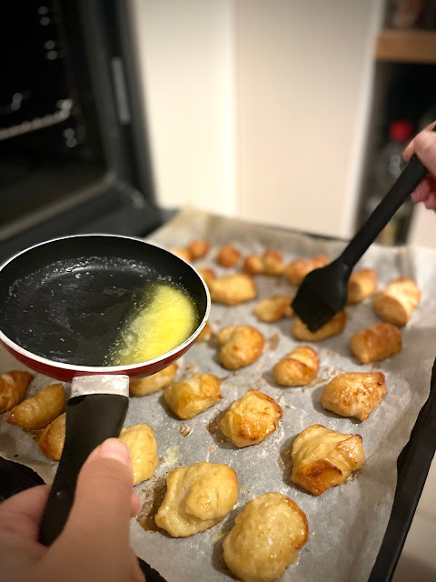 Butter each snack using a pastry brush