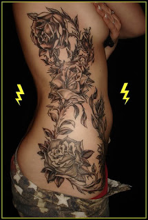 Large roses and vine extending to hip and chest