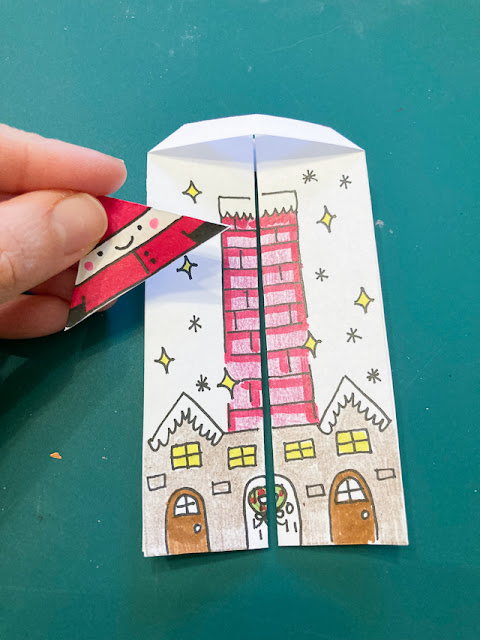 how to make a DIY climbing Santa Paper STEM craft with preschool elementary middle-school aged kids for easy STEM-filled Christmas afternoon fun