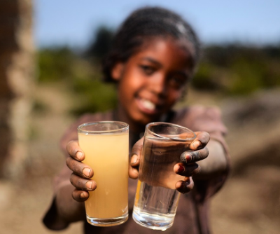 Children taking clean water and dirty water