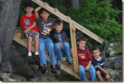 boys on the stairs to the water