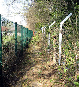 Railway path between West Wickham and Hayes: mesh fence being stripped out