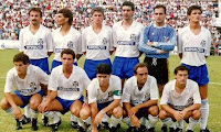 C. D. TENERIFE. Temporada 1988-89. Víctor, Luis Delgado, Guina, Herrero, Belza, Lema. Toño, Quique Medina, David Amaral, Mínguez y Perico Medina. C. D. TENERIFE 3 U. D. LAS PALMAS 1 Domingo 18/09/1988. Campeonato de Liga de 2ª División, jornada 3. Santa Cruz de Tenerife, estadio Heliodoro Rodríguez López. GOLES: 1-0: 6’, Víctor. 2-0: 40’, Perico Medina. 3-0: 68’, David Amaral, de penalti. 3-1: 90+2’, Onofre.