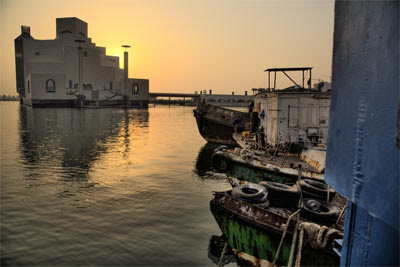 Fishing boats in the background of the Islamic museum.