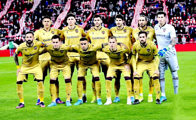 LEVANTE U. D. Temporada 2021-22. Óscar Duarte, Pepelu, Róber Pier, Melero, Martín Cáceres, Dani Cárdenas. Morales, De Frutos, Roger, Son y Miramón. ATHLETIC CLUB DE BILBAO 3 LEVANTE U. D. 1 Lunes 07/03/2022, 21:00 horas. Campeonato de Liga de 1ª División, jornada 27. Bilbao, Vizcaya, estadio San Mamés: 29.435 espectadores. GOLES: 1-0: 63’, Mikel Vesga. 2-0: 76’, Iñaki Williams. 3-0: 88’, Oier Zarraga. 3-1: 90+1’, Jorge De Frutos.