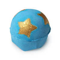 A spherical blue bath bomb filled with chunky golden cocoa butter stars on a bright background