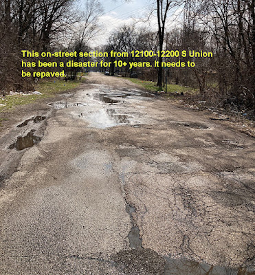 destroyed pavement 12100-12200 S Union