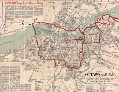 Map of Ottawa and Hull, showing most of the cities but cropping out additional text and map features. Extents are Rockcliffe/Eastview (Vanier, East), Hog's Back (South), Woodroffe and Aylmer's Connaught racetrack (West) and Leamy Lake (North). The map has streets and railroads drawn as lines, water coloured pale blue, and prominent buildings drawn in with symbols to indicate if it's a church, school, etc. At the top left is four columns of text with a red headline 'A MOTOR DRIVE through Ottawa's Parks and Driveways'. A red line follows certain streets around the map, with an outer loop going (if clockwise) north on Sussex to and around Rockcliffe, down Mackay in New Edinburgh to the St. Patrick St bridge, south on Charlotte, east on Laurier, south on Elgin with a detour around the Victoria Memorial Museum Building, looping around the Glebe on the FDC Driveway, through the Experimental Farm, east on Carling, north on Island Park Drive to the Aylmer Road in Hull, connecting back up over the Alexandra Bridge with Sussex, where an extra segment connects with Parliament Hill. A thinner red line follows Wellington west into LeBreton Flats and up Booth Street to Hull.