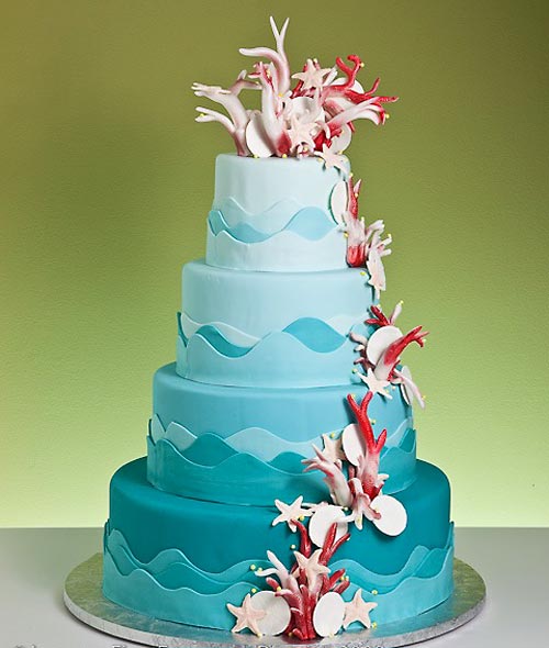 Beautiful three tiered rock candy crystals wedding cake with blue and red 