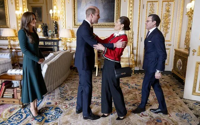 Crown Princess Victoria wore a red jacket by alice+olivia. The Princess of Wales wore a green dress by Emilia Wickstead