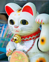 "Manekineko1003". Licensed under Public Domain via Commons - https://commons.wikimedia.org/wiki/File:Manekineko1003.jpg#/media/File:Manekineko1003.jpg