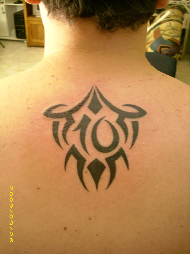 tribal tattoos for men back. Upper Back Tribal Tattoo Men