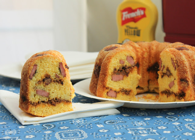 Food Lust People Love: Hot dogs and spicy beef chili are baked up in a cheesy cornbread batter to create a savory chili cheese corn dog Bundt you can slice up and serve at your next party.