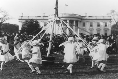 Historical photo of children with maypole at White House Easter Egg Roll