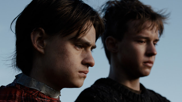 jaeden martell and maxwell jenkins looking pensive