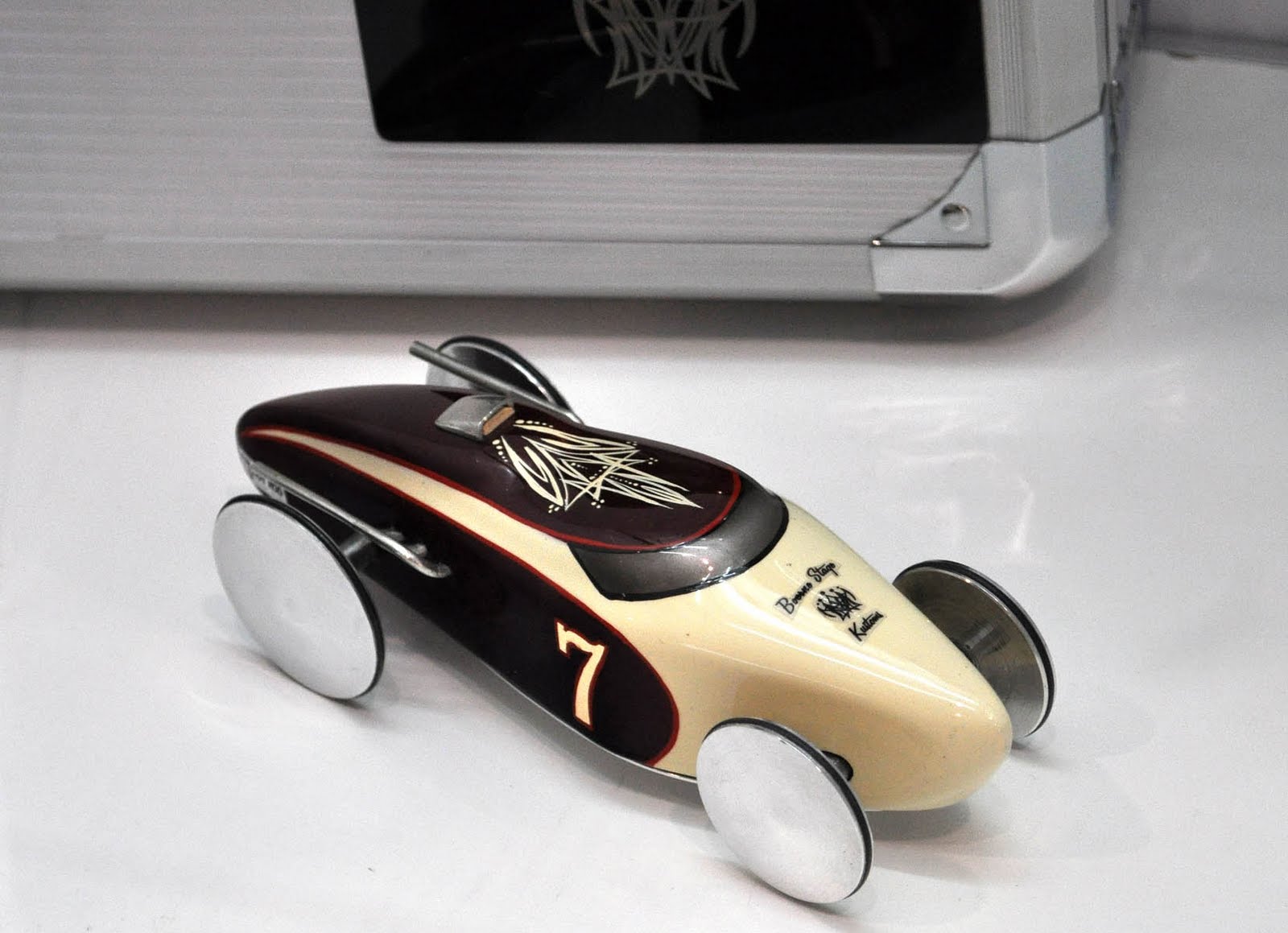 Just a car guy  SEMA had hot rod builders Pinewood Derby cars