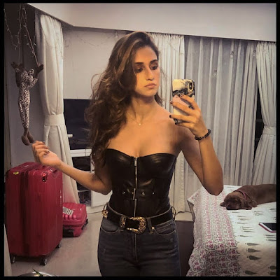 Disha Patani in black bustier clicking mirror selfie in her bedroom baring busty boobs