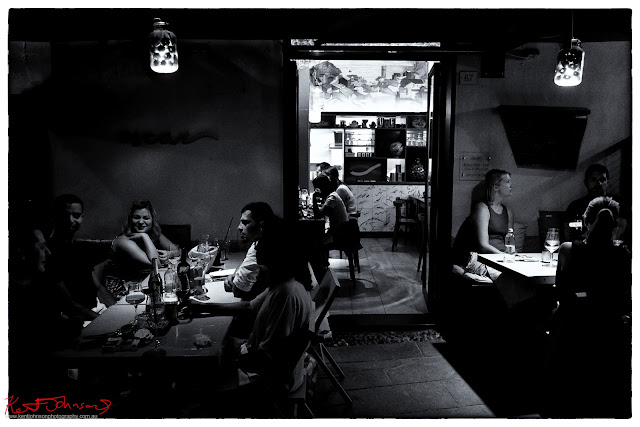 Looking in from the street at  Trattoria de Oscar, Monterosso, Cinque Terre. Photograph by Kent Johnson