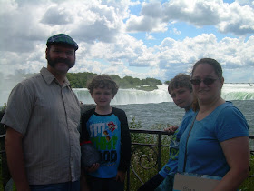 The four of us with the horseshoe falls behind us.
