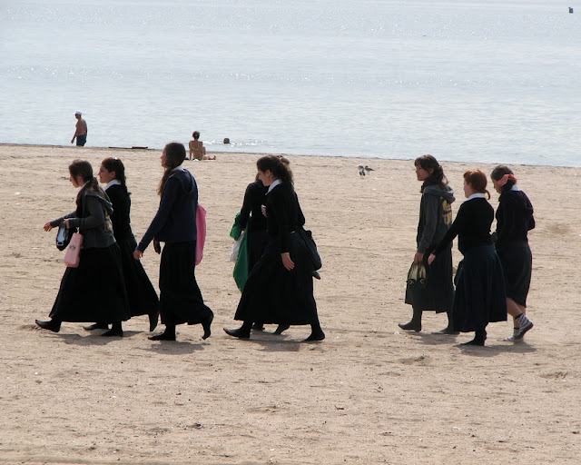 Walking on the beach, Coney Island, Brooklyn, New York