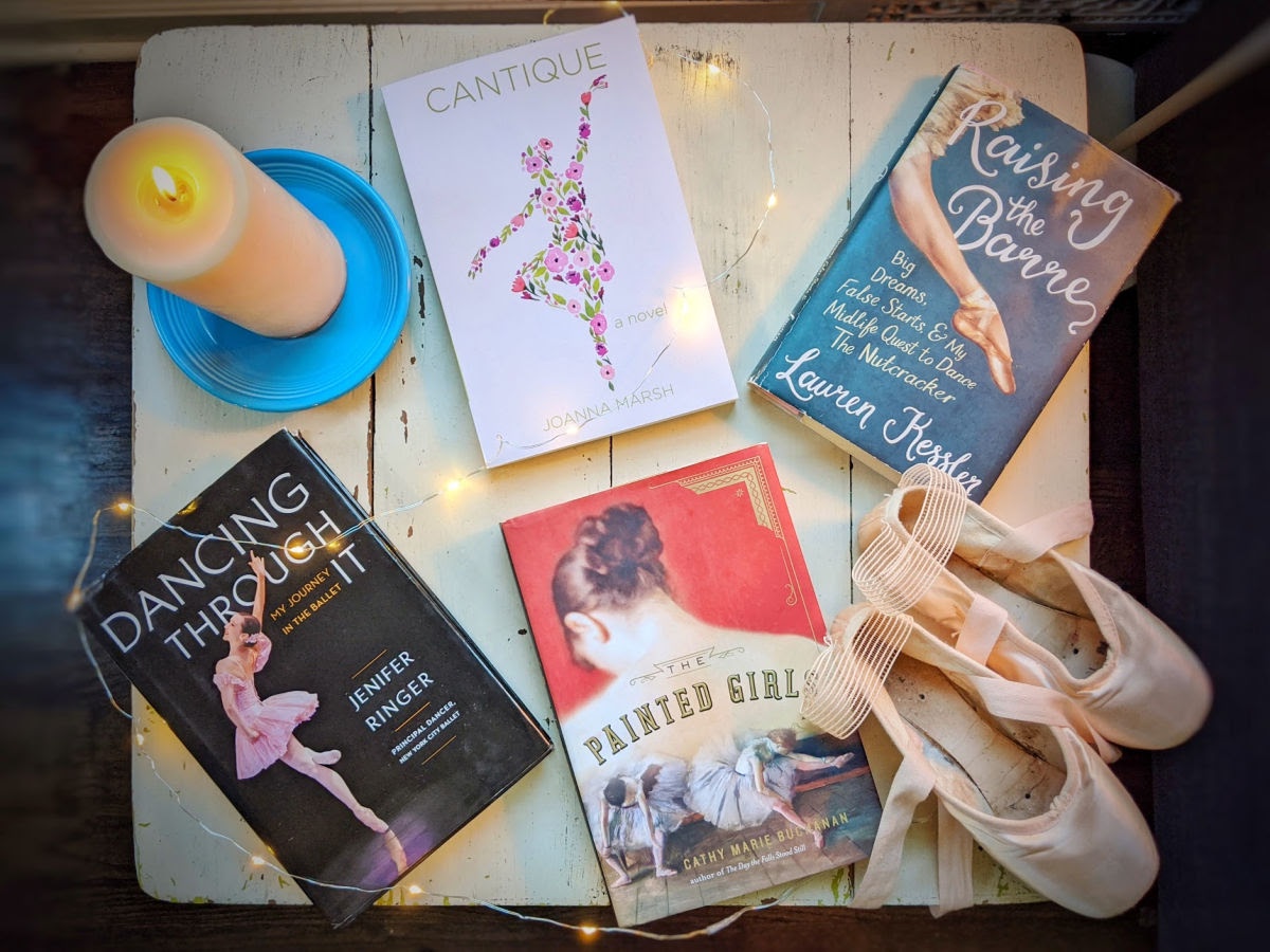 Ballet Book Club books of the month and a pair of pointe shoes.