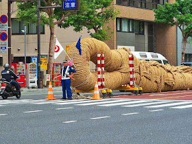 Japanese policeman,half of tug-o-war rope,street