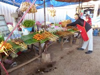 Du lịch lào -  Ăn thịt sống ở Xiêng Khoảng