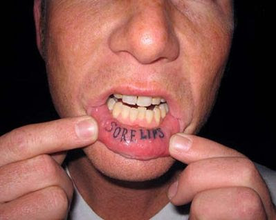 Sore lips tattoo.