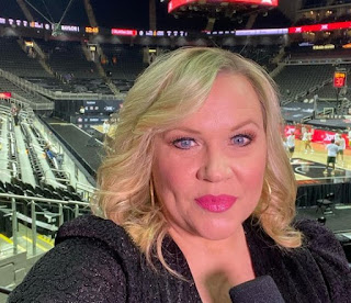 Holly Rowe clicking selfie