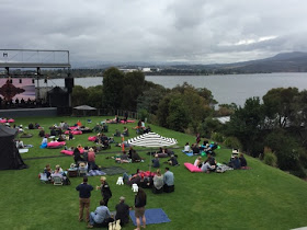 People gathered for a concert outside MONA, Hobart