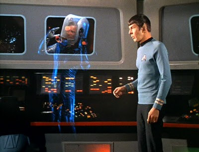 Kirk's appearance on the bridge especially Spock's approaching him