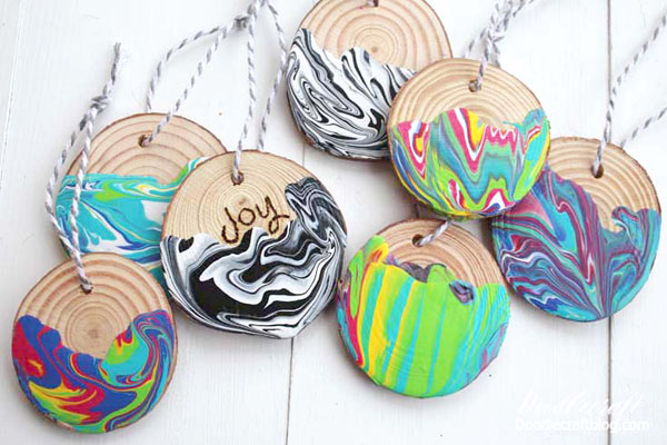 This paint is specially formulated so it doesn't blend together...and turn to brown mud.  The colors all stay separate and bright.    Let's make these amazing marbled wood slice ornaments!