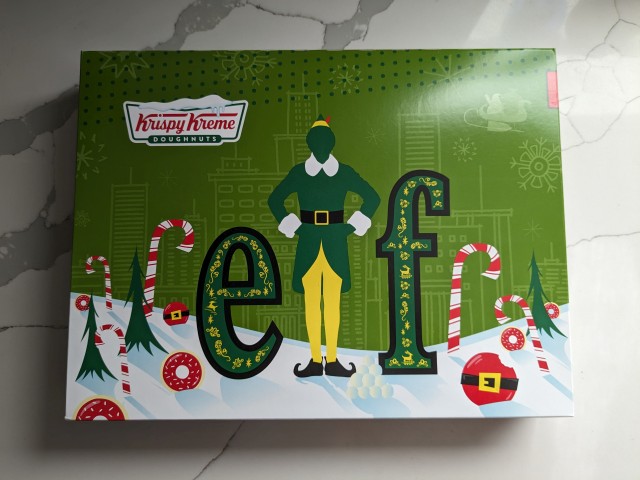 The box for a dozen Krispy Kreme Elf-themed donuts.