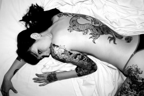 girl with dragon tattoo back. tattoo girl