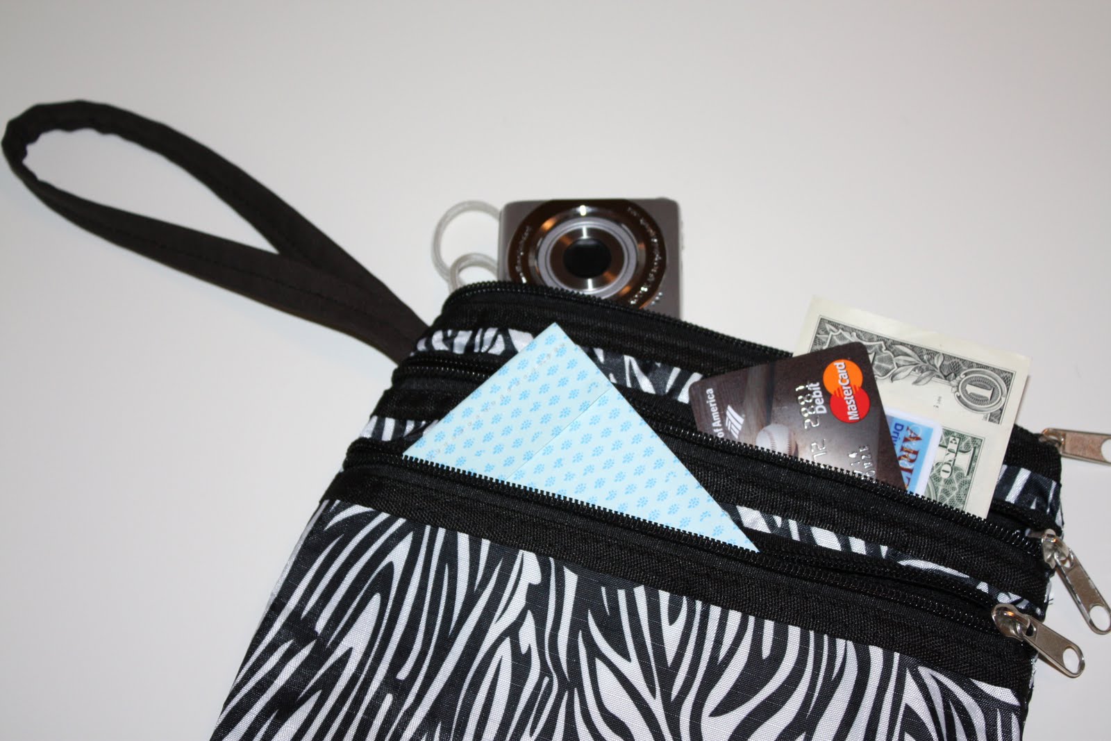 ... , small makeup bag, or even a homemade pouch into a great wristlet