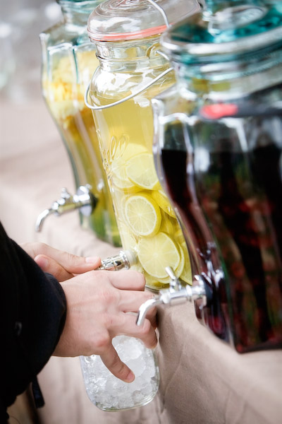  Ball Mason jar drink dispenser completes the garden wedding reception