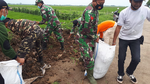 Harlah NU ke 95, Satkorcab Banser Kendal Adakan Karya Bakti