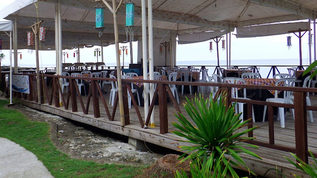 external view of Baybayon Seafood Restaurant with the sea in the background at Kuting Reef Resort and Spa in Macrohon Southern Leyte