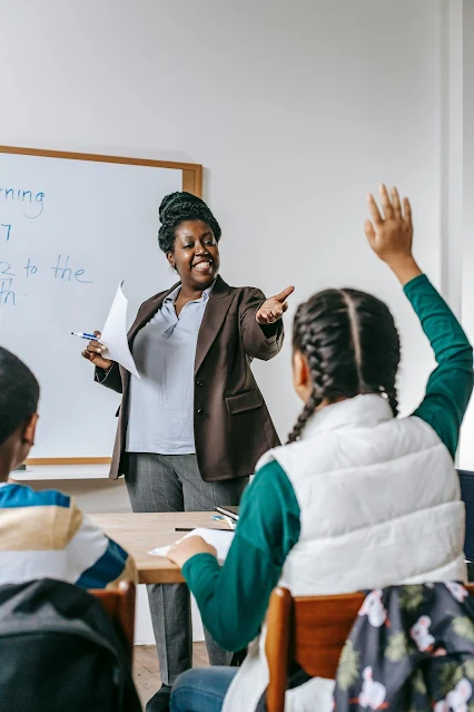 Teacher Teaching Children's in Tution