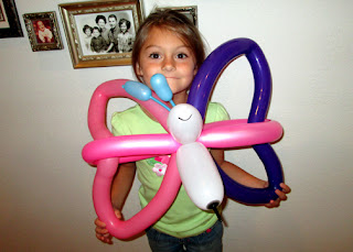 On our way home from the Science Center, we stopped by Culver's in Eureka where Lollypop the Balloon Artist was twisting balloons. After patiently waiting almost an hour, Tessa finally got her balloon butterfly. There were over 80 kids that day!